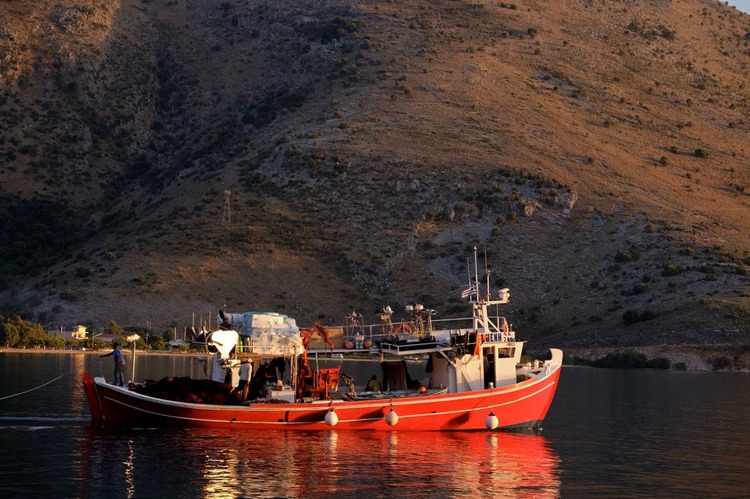 Red Trawler Leaving Plataria.jpg